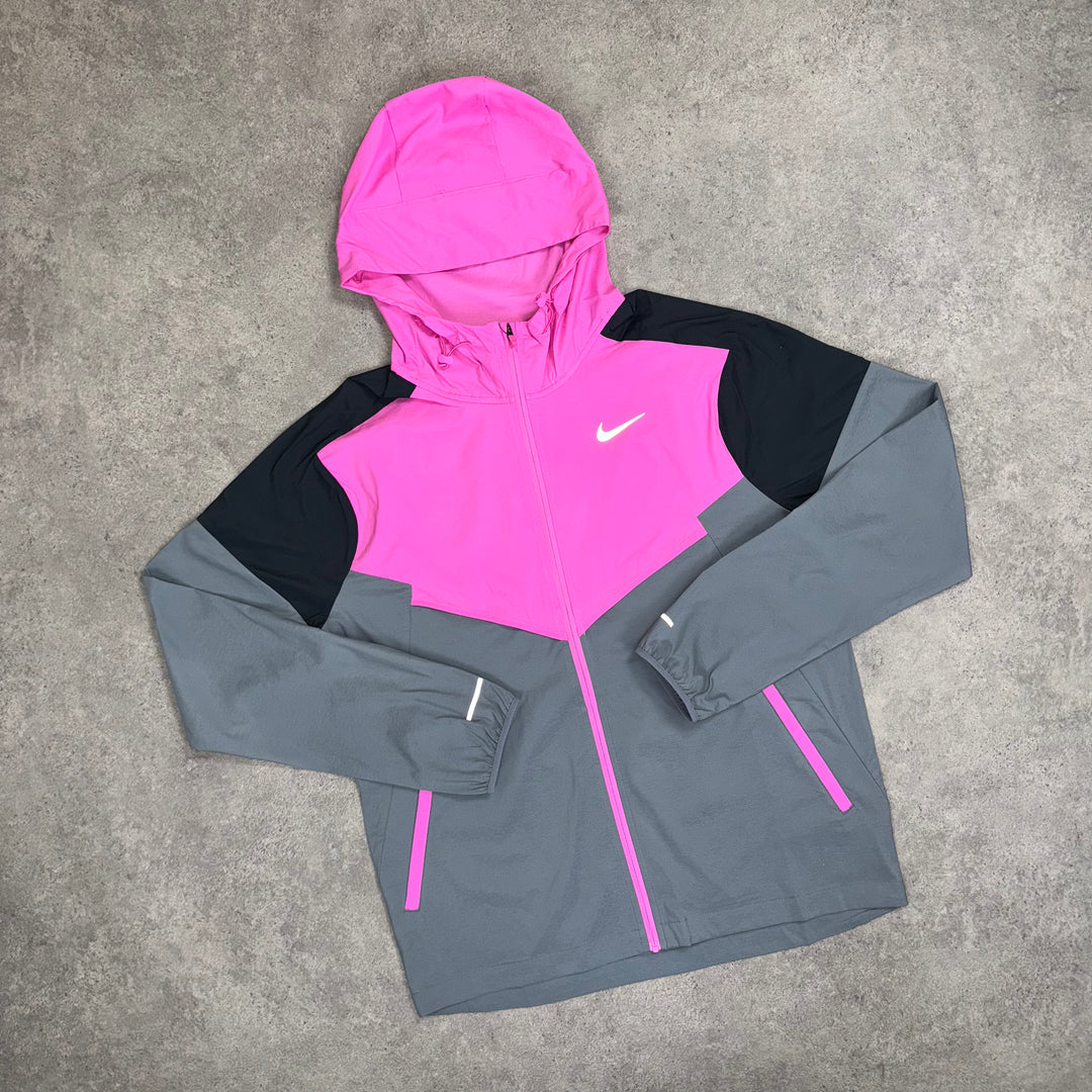 Nike Packable Windrunner (Playful-Pink/Grey) – Pristine Moda Nike Packable Windrunner (Playful-Pink/Grey) – Pristine Moda